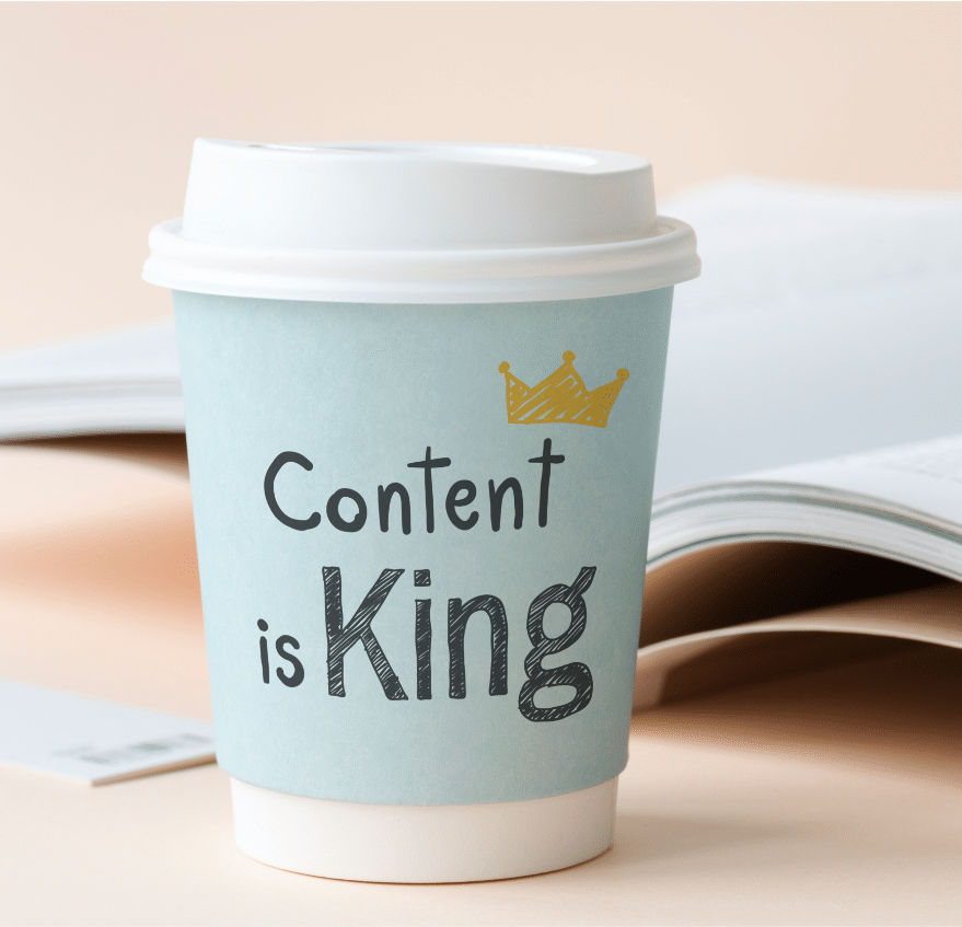 Kaffeebecher mit Aufschrift „Content is King“